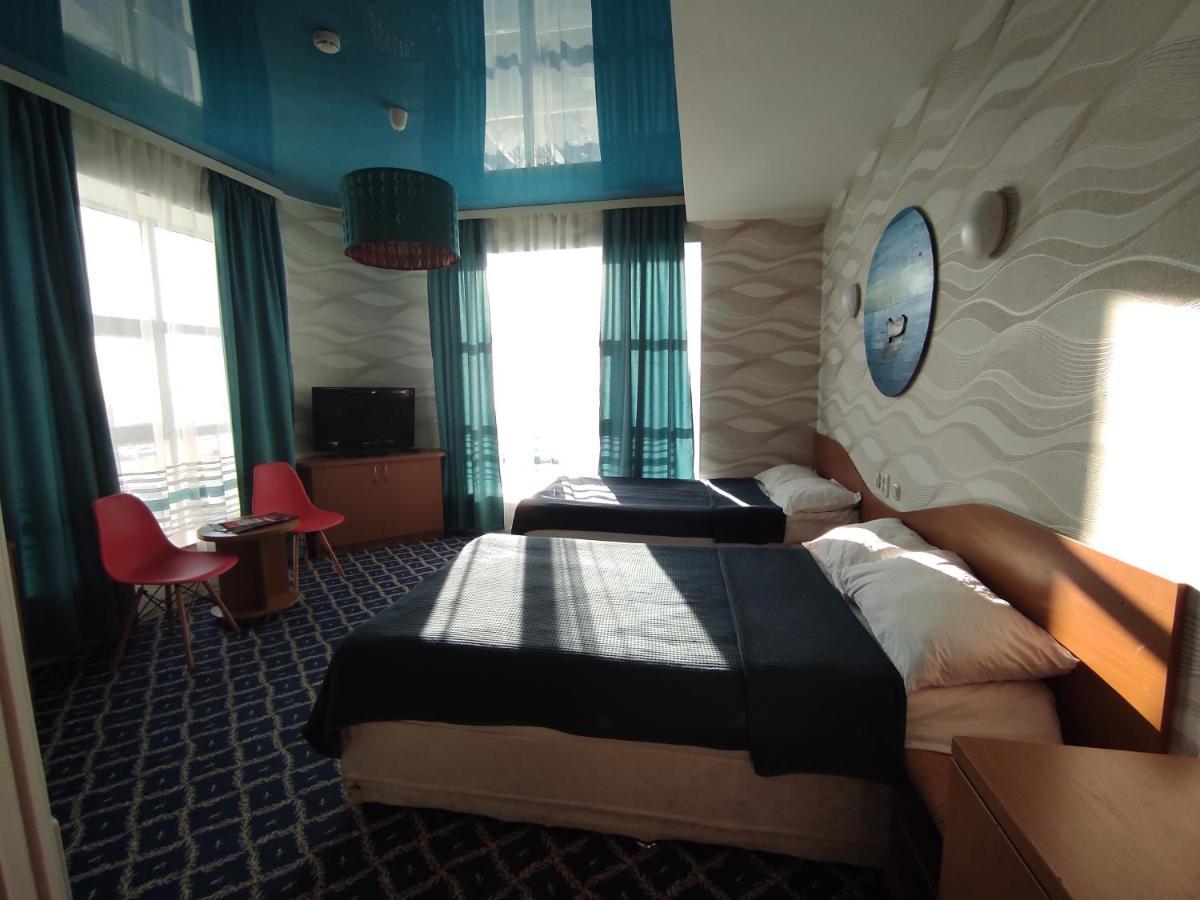 Three Dolphins Hotel Актау Екстер'єр фото